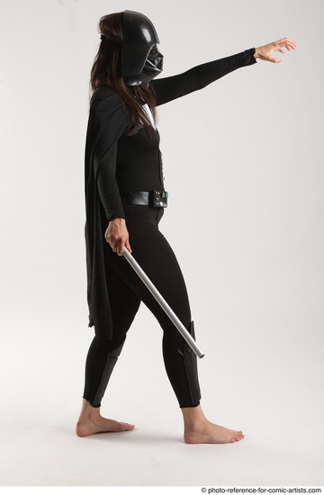 Woman Adult Average White Fighting with sword Standing poses Coat