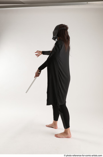 Woman Adult Average White Fighting with sword Standing poses Coat