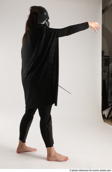 Woman Adult Average White Fighting with sword Standing poses Coat