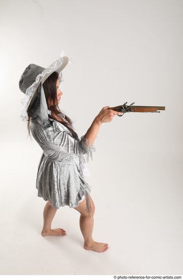 Woman Adult Athletic White Fighting with gun Standing poses Casual