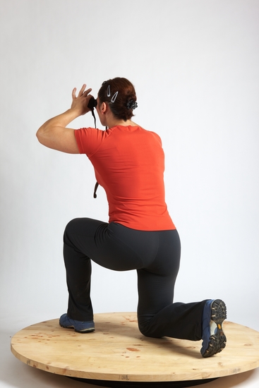 Woman Adult Average White Neutral Kneeling poses Casual