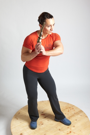 Woman Adult Average White Fighting with gun Standing poses Casual