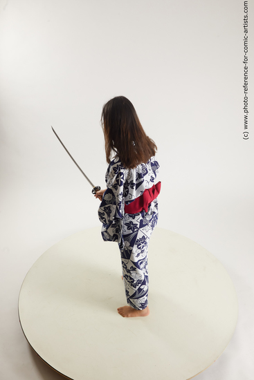 Woman Young Athletic Fighting with sword Asian Costumes