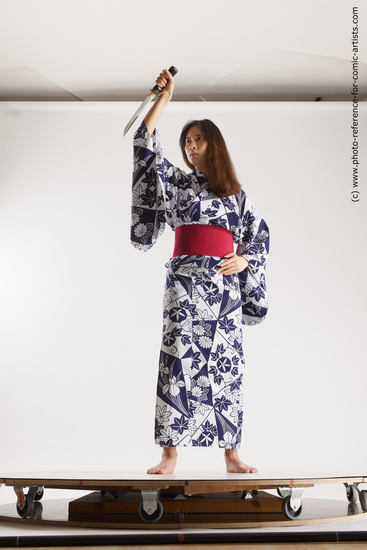 Woman Young Athletic Standing poses Asian Costumes