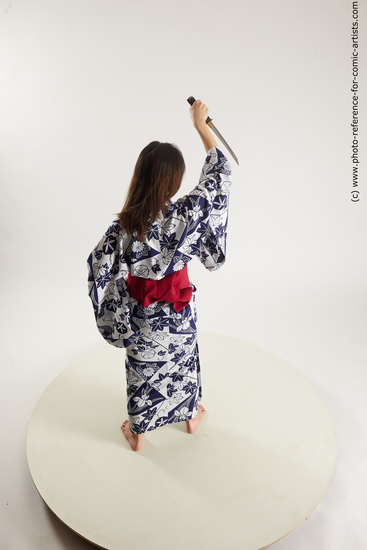 Woman Young Athletic Standing poses Asian Costumes