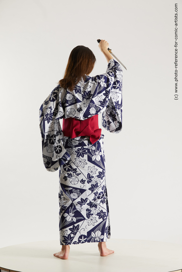 Woman Young Athletic Standing poses Asian Costumes