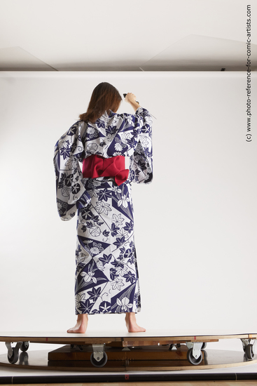 Woman Young Athletic Standing poses Asian Costumes