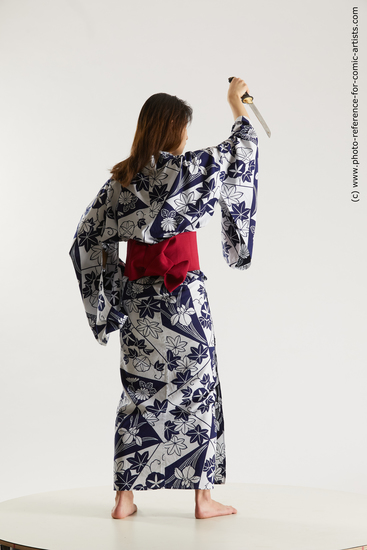 Woman Young Athletic Standing poses Asian Costumes