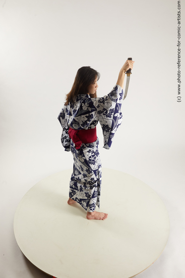 Woman Young Athletic Standing poses Asian Costumes