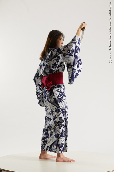 Woman Young Athletic Standing poses Asian Costumes