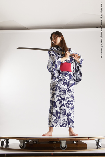 Woman Young Athletic Fighting with sword Standing poses Asian Costumes