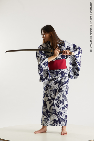 Woman Young Athletic Fighting with sword Standing poses Asian Costumes