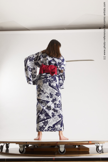 Woman Young Athletic Fighting with sword Standing poses Asian Costumes