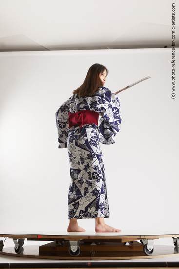 Woman Young Athletic Fighting with sword Standing poses Asian Costumes