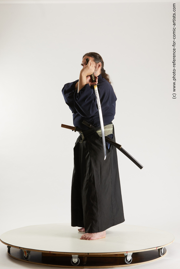 Man Adult Average White Fighting with sword Standing poses Costumes