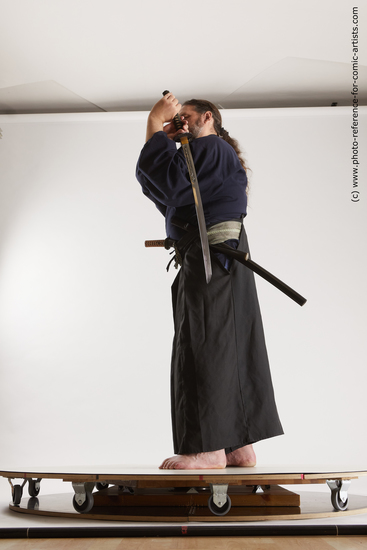 Man Adult Average White Fighting with sword Standing poses Costumes