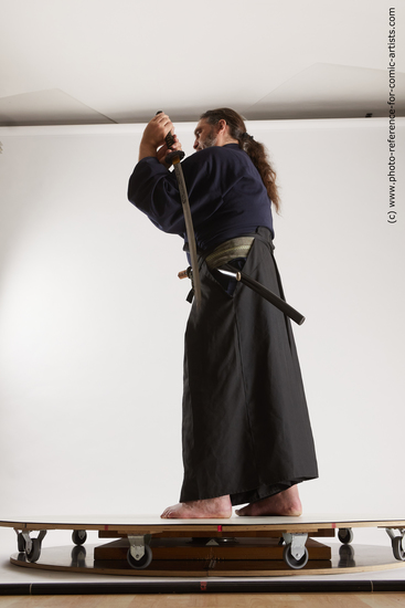 Man Adult Average White Fighting with sword Standing poses Costumes