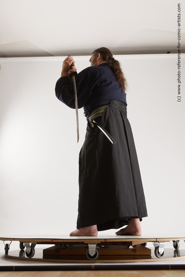 Man Adult Average White Fighting with sword Standing poses Costumes