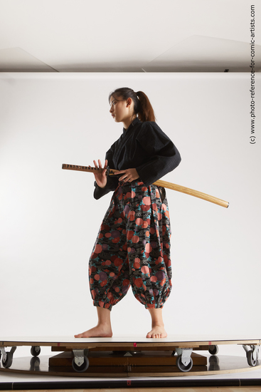 Woman Young Athletic Fighting with sword Standing poses Asian Costumes