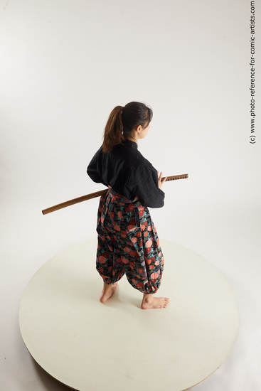 Woman Young Athletic Fighting with sword Standing poses Asian Costumes