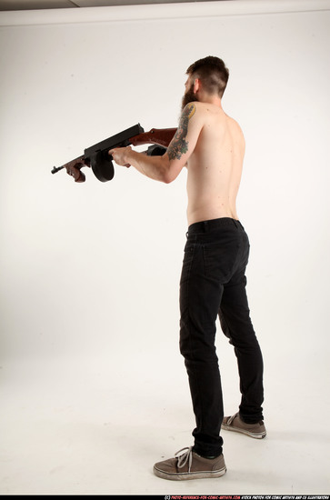 Man Adult Athletic White Fighting with submachine gun Standing poses Pants