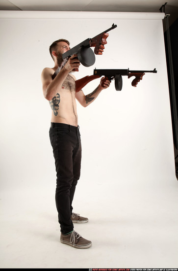 Man Adult Athletic White Fighting with submachine gun Standing poses Pants