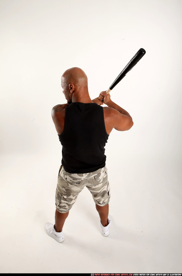 Man Adult Athletic Black Standing poses Casual Fighting with bat