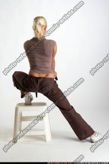 IVA KNEELING ON CHAIR SHOOTINGDOWN