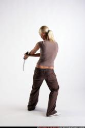 Woman Young Athletic White Fighting with sword Moving poses Sportswear