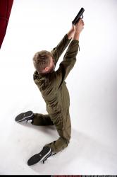 Man Young Average White Fighting with gun Kneeling poses Army