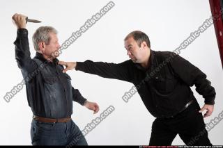 men-knife-fight