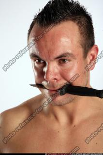 2009 08 JOHNNY KNIFE IN MOUTH 09.jpg