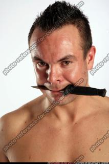 2009 08 JOHNNY KNIFE IN MOUTH 08.jpg