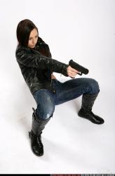 Woman Young Athletic White Fighting with gun Crouching Sportswear