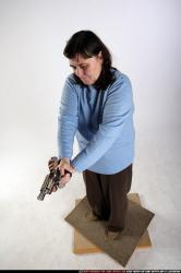 Woman Old Chubby White Fighting with gun Standing poses Casual