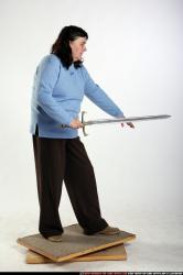 Woman Old Chubby White Fighting with sword Standing poses Casual