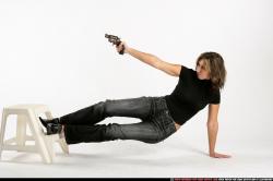 Woman Adult Athletic White Fighting with gun Moving poses Casual