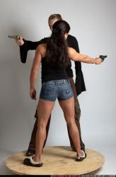 Adult Muscular White Fighting with gun Standing poses Casual