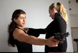 Adult Muscular White Fighting with gun Standing poses Casual