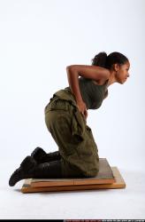 Woman Young Athletic Black Neutral Kneeling poses Army