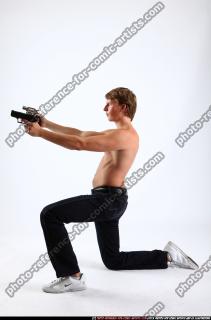 patrick-kneeling-dual-pistols