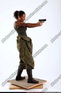 2010 10 JENNA LEAN BACKWARD SHOOTING PISTOL 05 B