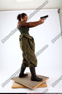 2010 10 JENNA LEAN BACKWARD SHOOTING PISTOL 05 C