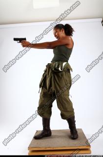 2010 10 JENNA LEAN BACKWARD SHOOTING PISTOL 00 C