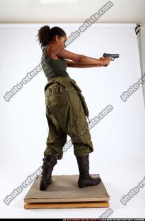 2010 10 JENNA LEAN BACKWARD SHOOTING PISTOL 04 C