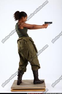 2010 10 JENNA LEAN BACKWARD SHOOTING PISTOL 04 B