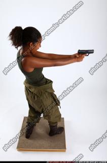 2010 10 JENNA LEAN BACKWARD SHOOTING PISTOL 04 A