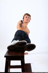 Man Young Athletic White Fighting with gun Moving poses Pants