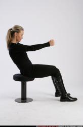 Woman Adult Athletic White Daily activities Sitting poses Casual