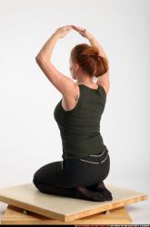 Woman Adult Average White Fitness poses Kneeling poses Sportswear